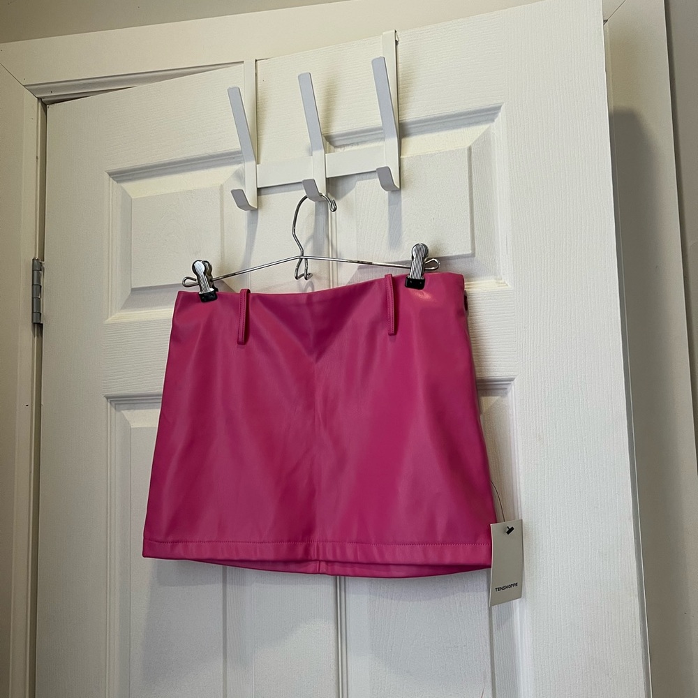 Pink patent leather mini skirt